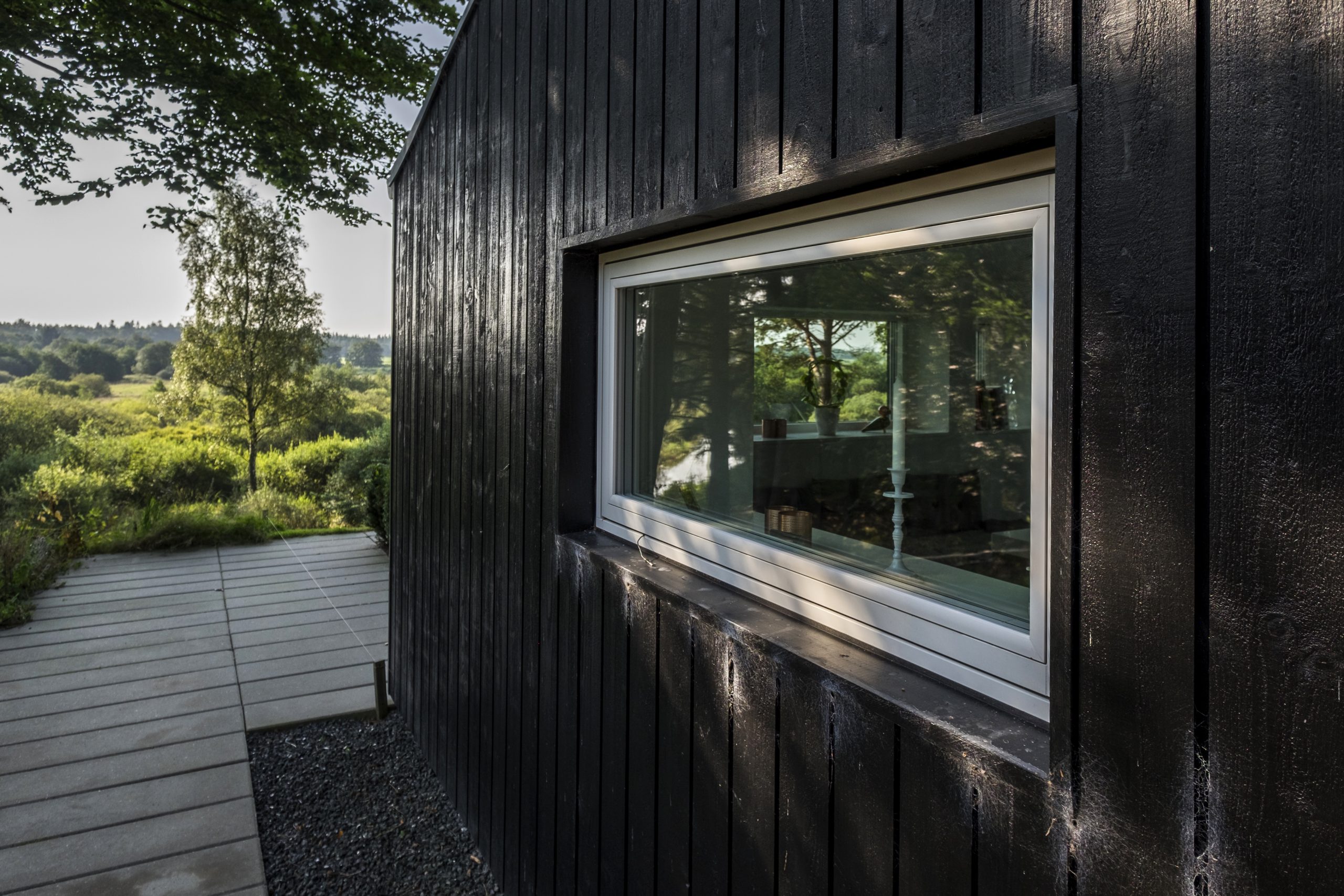 rationel aura window in wooden cabin home