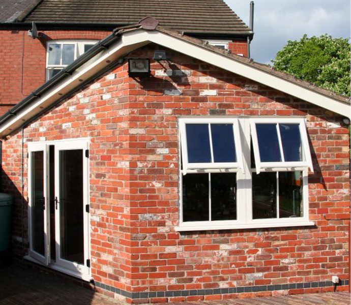 Home extension with two casement windows Hereford and patio doors